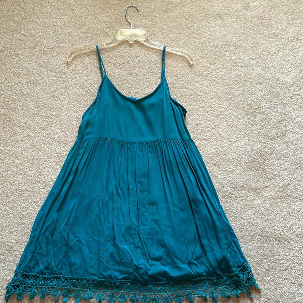 Teal dress with lace bottom lined in good shape